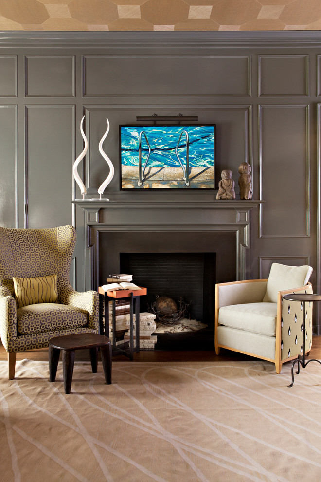 Traditional study in Orange County with a standard fireplace and a metal fireplace surround.