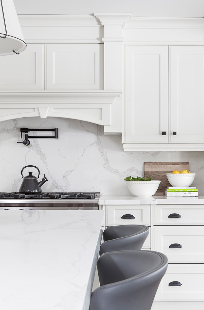 Example of a transitional kitchen design in Toronto