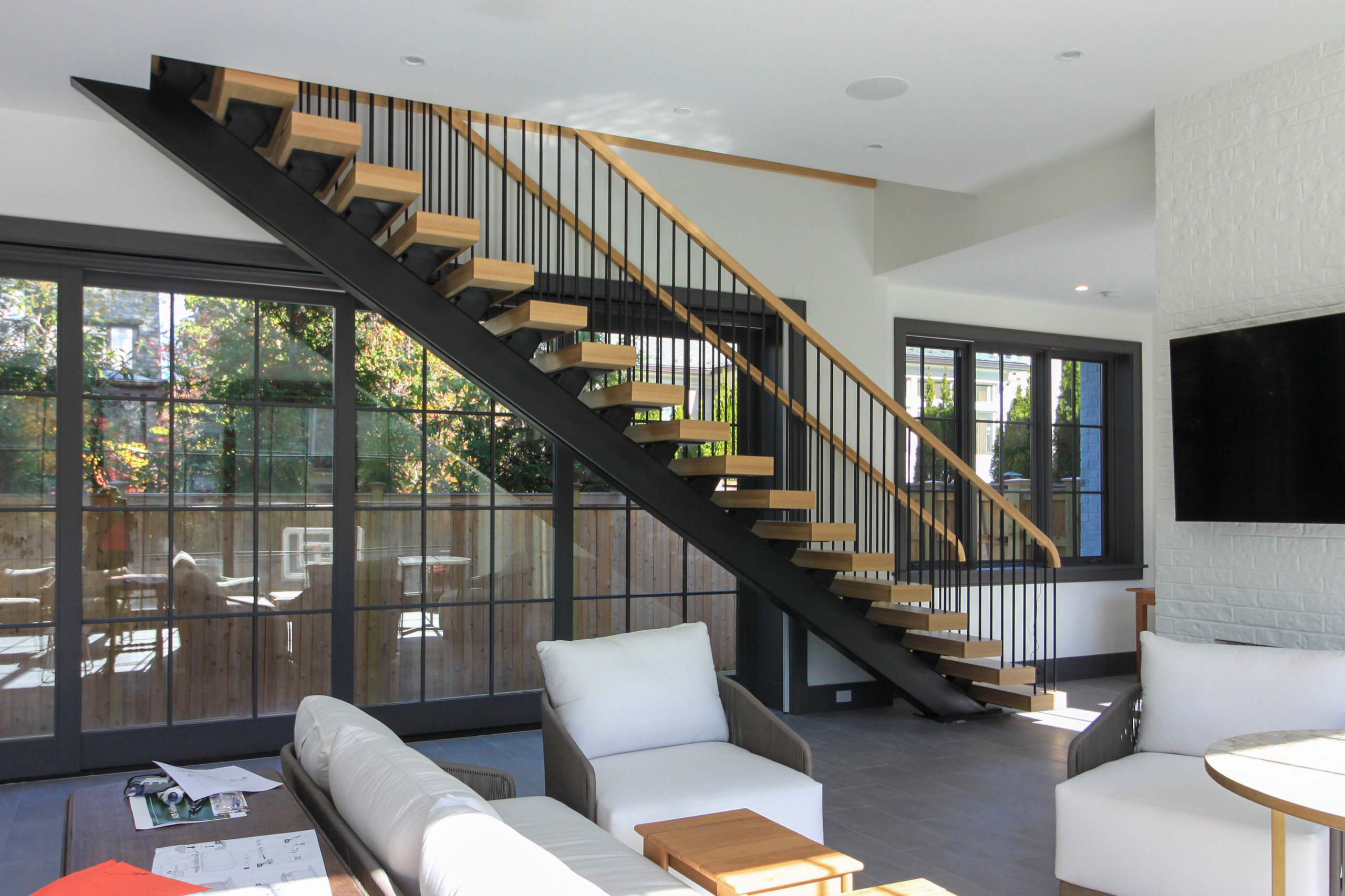96_Dramatic cantilevered no-riser staircase, Bethesda, MD 20814