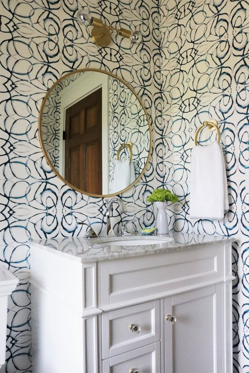 This is an example of a transitional powder room in Milwaukee.