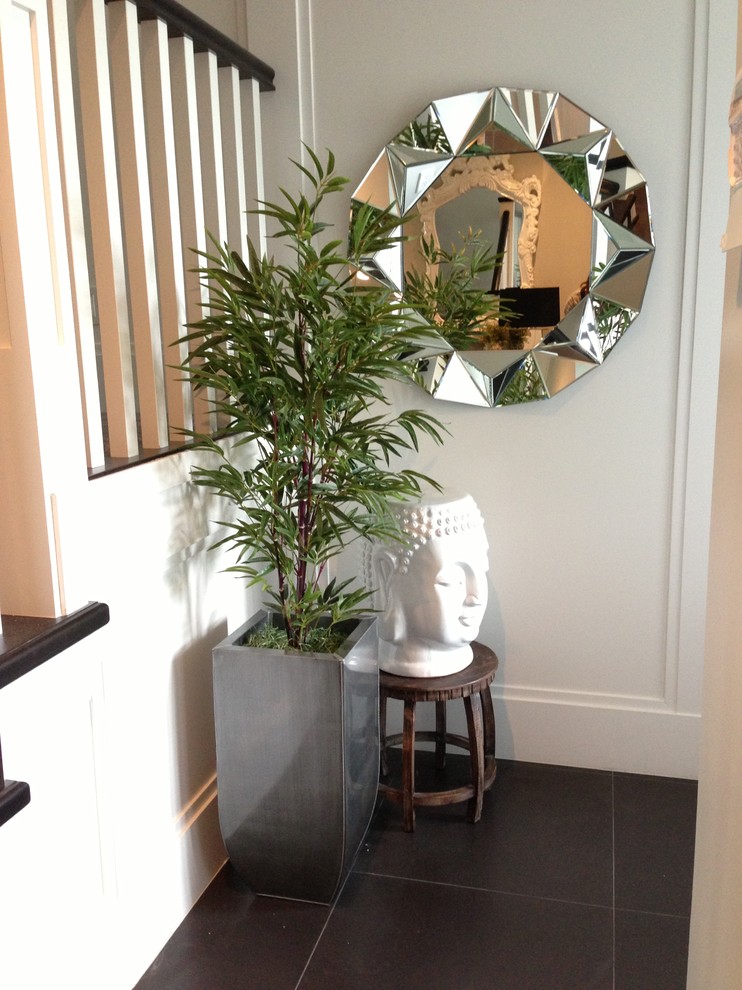 Mid-sized transitional hallway in Vancouver with grey walls.