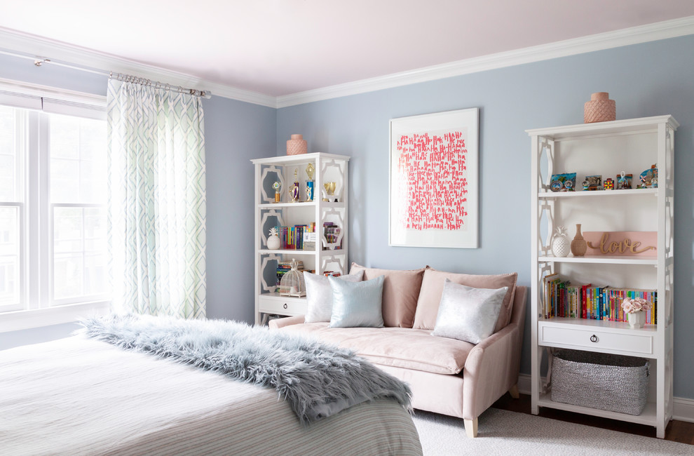 Transitional teen room in New York with blue walls, dark hardwood floors and brown floor for girls.