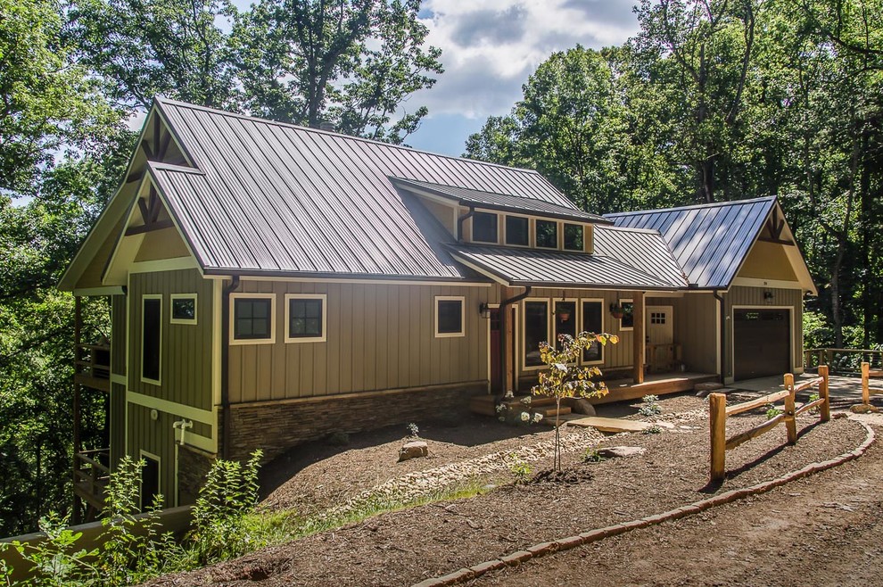 Inspiration for a mid-sized transitional brown three-story mixed siding gable roof remodel with a metal roof