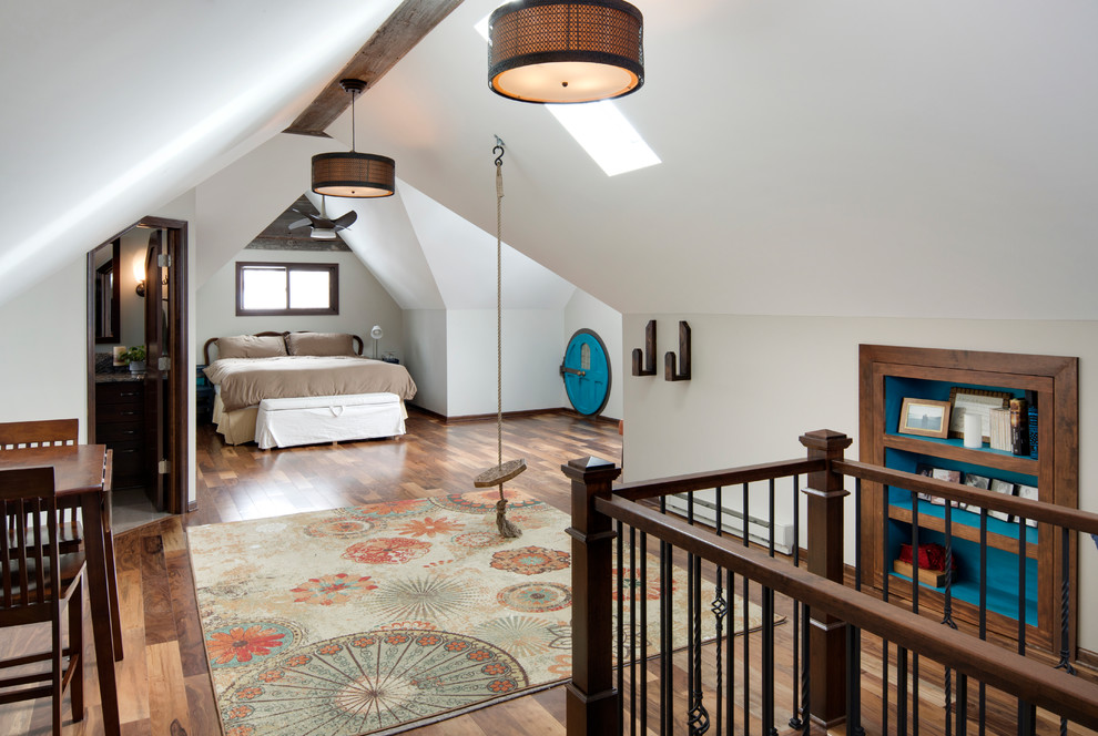 Attic master suite with a Hobbit Hole - We took this unfinished attic and turned it into a master suite full of whimsical touches.  There is a round Hobbit Hole door that leads to a carpeted play room for the kids, a rope swing and 2 secret bookcases that are opened when you pull the secret Harry Potter books.