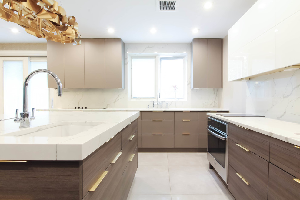 Photo of a large contemporary u-shaped eat-in kitchen in New York with an undermount sink, flat-panel cabinets, brown cabinets, quartzite benchtops, white splashback, stone slab splashback, stainless steel appliances, ceramic floors, with island, grey floor and yellow benchtop.