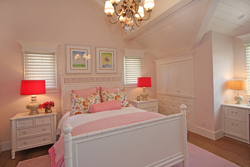 Inspiration for a contemporary kids' room for girls with pink walls.