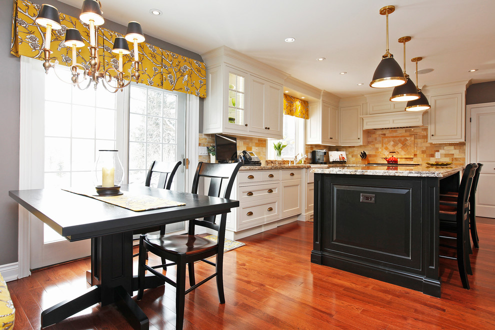 Eat-in kitchen - large transitional u-shaped medium tone wood floor and brown floor eat-in kitchen idea in Toronto with a farmhouse sink, raised-panel cabinets, white cabinets, granite countertops, yellow backsplash, marble backsplash, paneled appliances and an island