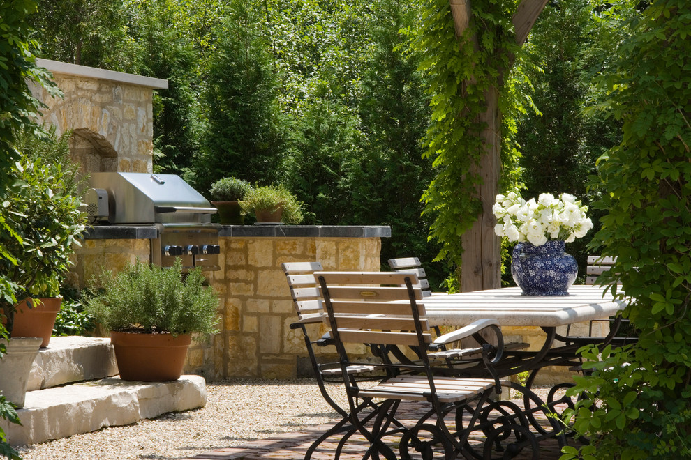 Inspiration for an expansive traditional backyard patio in Chicago with decomposed granite and a pergola.