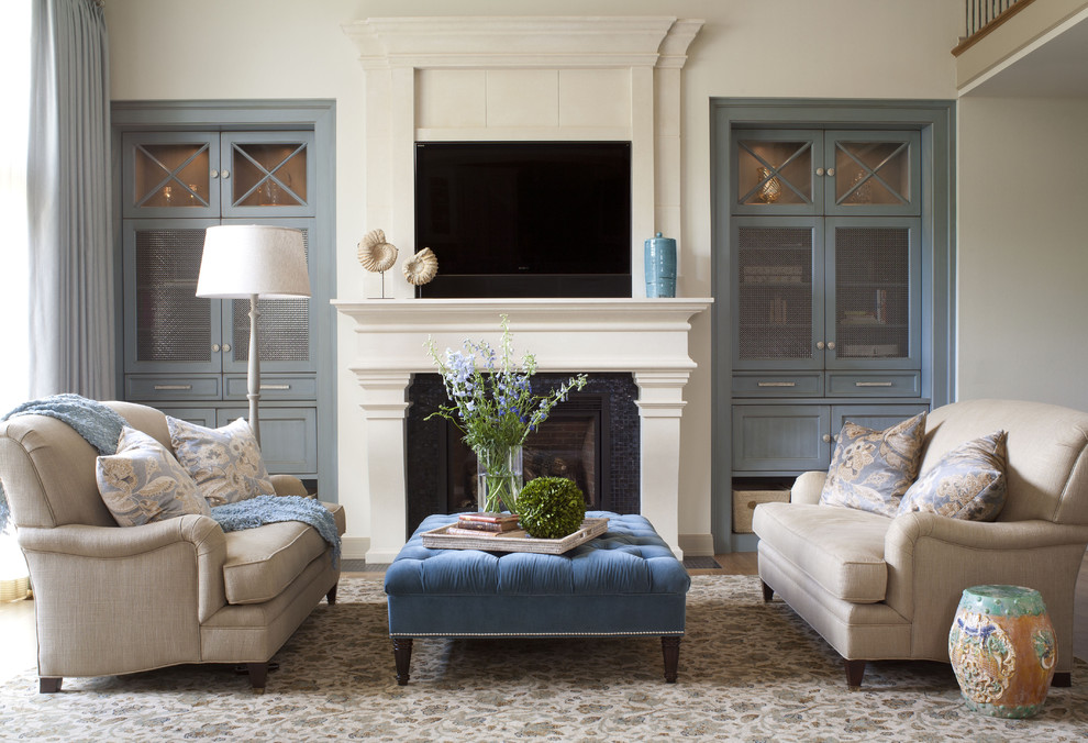 This is an example of a transitional formal living room in Denver with a standard fireplace.