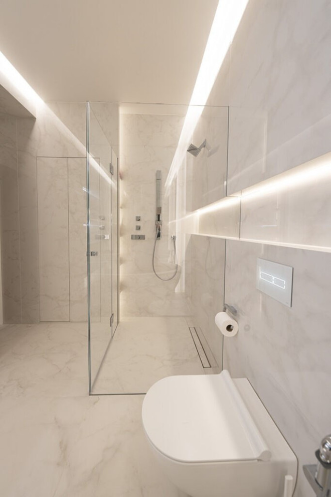 Photo of a large modern grey and white ensuite bathroom in London with open cabinets, white cabinets, a built-in bath, a shower/bath combination, a bidet, white tiles, glass tiles, white walls, ceramic flooring, a built-in sink, stainless steel worktops, white floors, a hinged door, grey worktops, feature lighting, a single sink, a floating vanity unit, a wood ceiling and wainscoting.