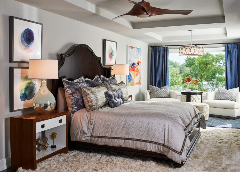 Transitional bedroom in Other with grey walls.