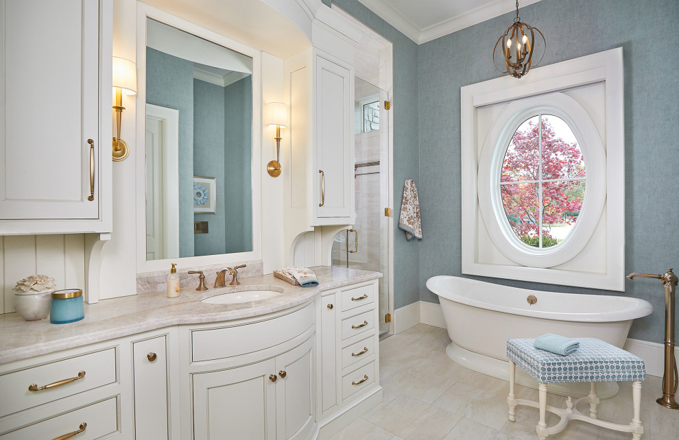 French country master blue tile ceramic tile, beige floor, single-sink and wallpaper bathroom photo in Grand Rapids with beaded inset cabinets, white cabinets, blue walls, an undermount sink, quartz countertops, a hinged shower door, beige countertops and a built-in vanity