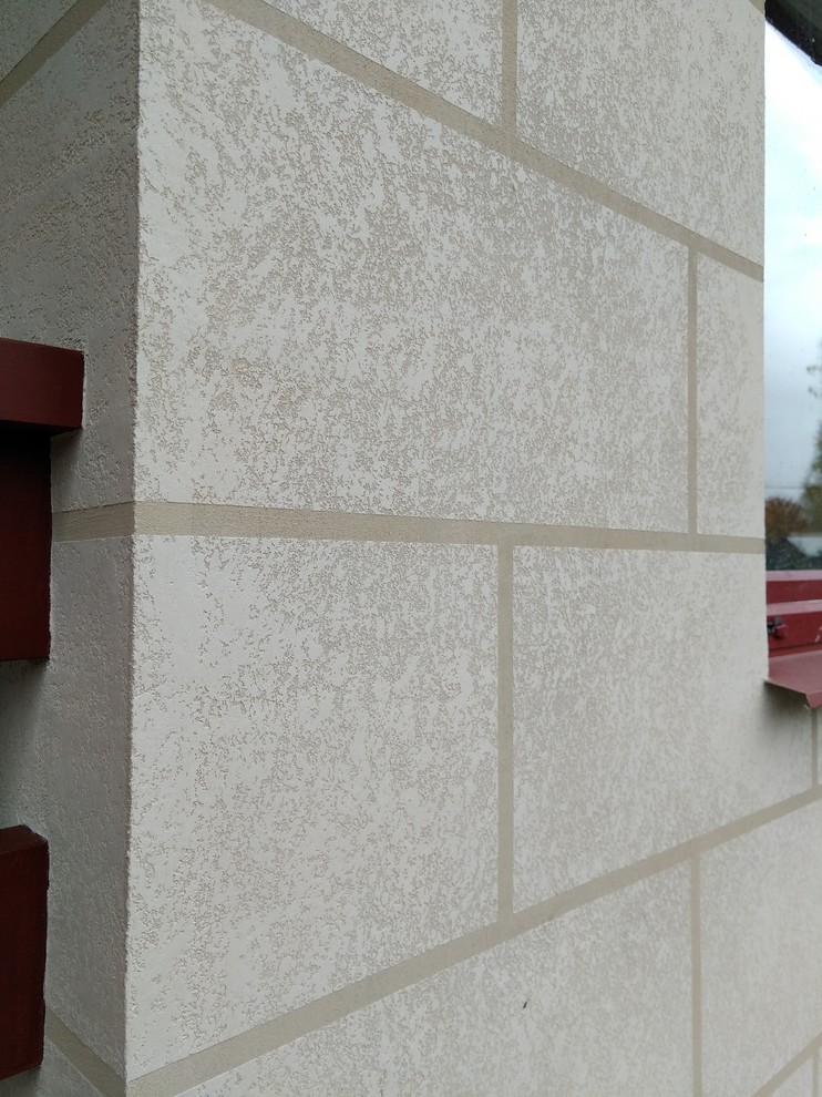 Изготовление фасада из декоративной штукатурки в Кириши