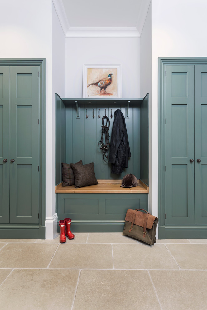 Inspiration for a mid-sized traditional entryway in Hampshire with limestone floors.