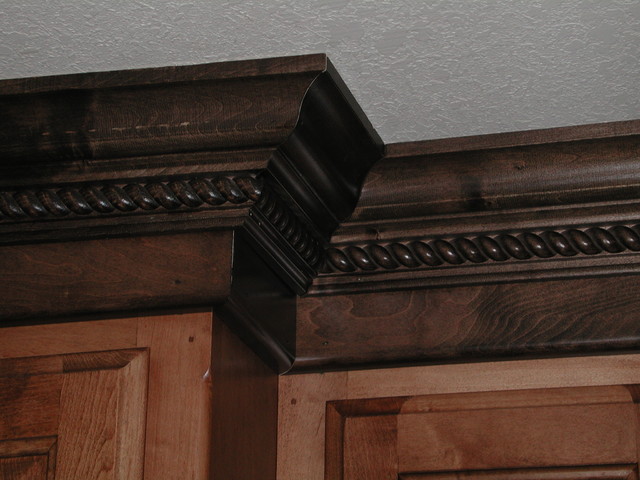 Maple Stained Cabinets With A Darker Crown Molding Traditional