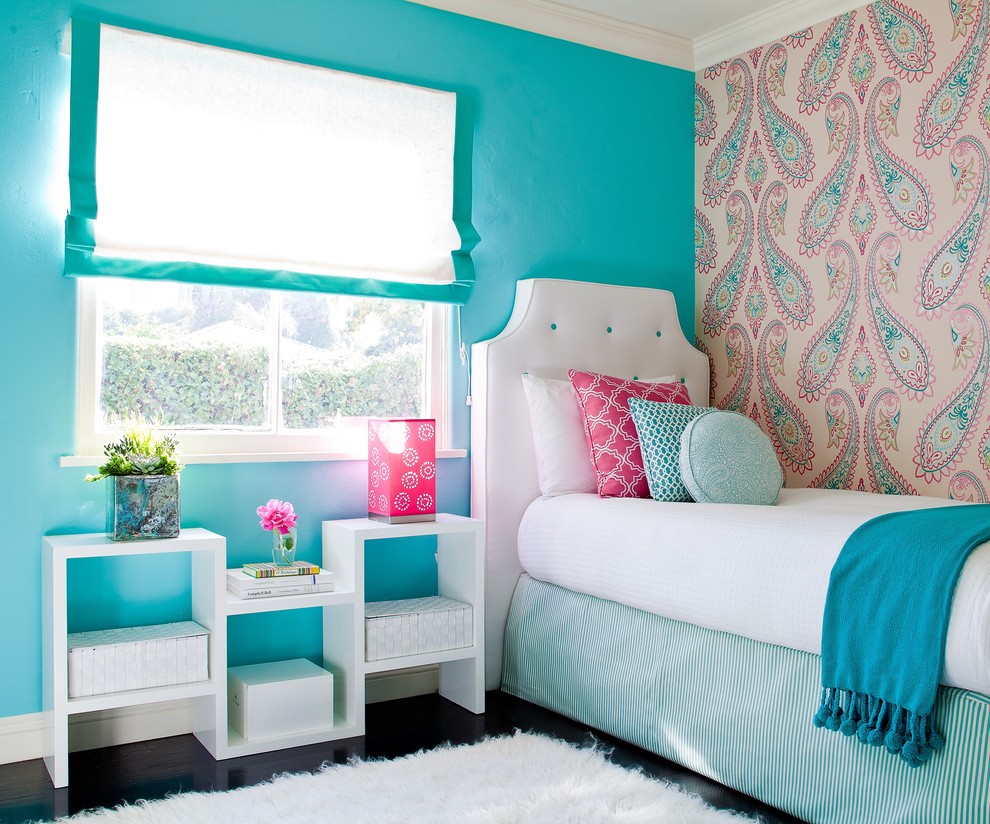 Inspiration for a transitional kids' bedroom for kids 4-10 years old and girls in Los Angeles with dark hardwood floors and multi-coloured walls.