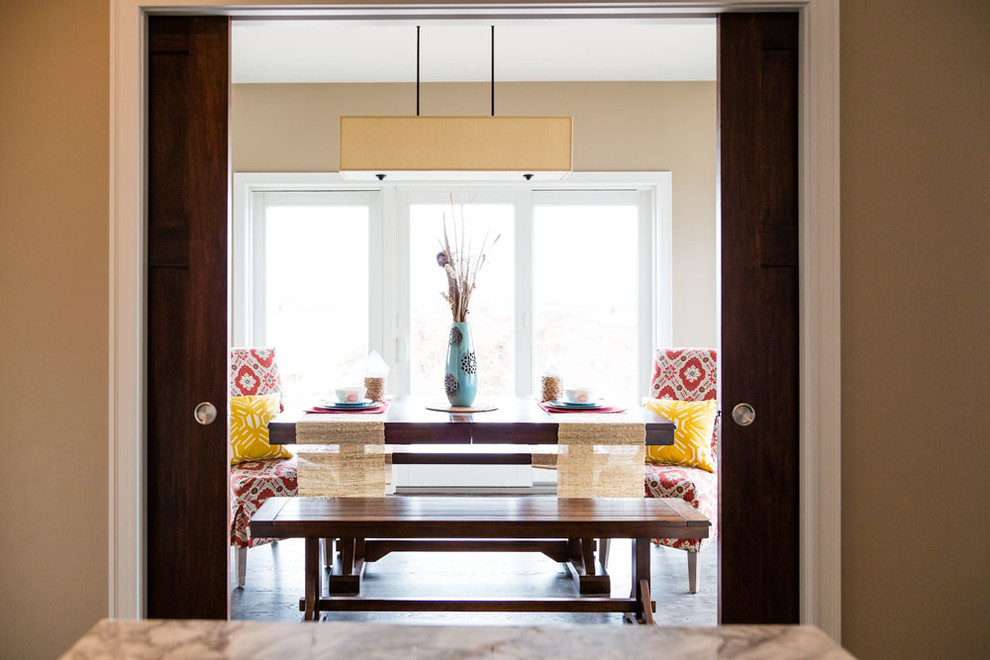 Enclosed dining room - mid-sized transitional enclosed dining room idea with beige walls and no fireplace