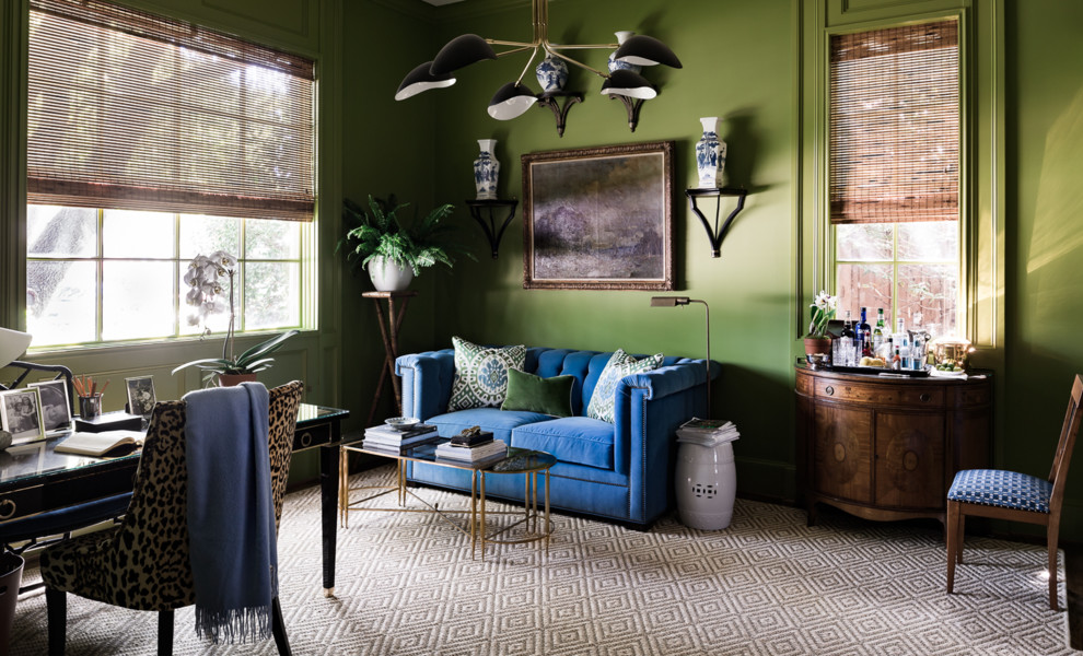 This is an example of a large eclectic home office in Dallas with green walls, dark hardwood floors, no fireplace, a freestanding desk and brown floor.