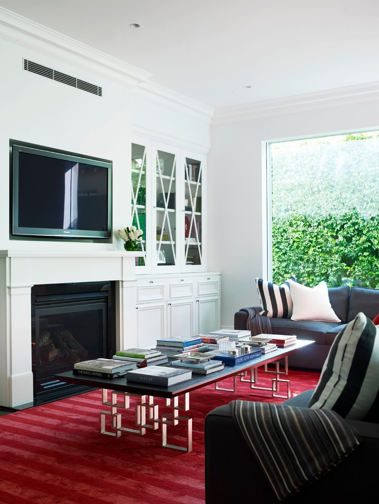 Photo of a traditional family room in Sydney with white walls.