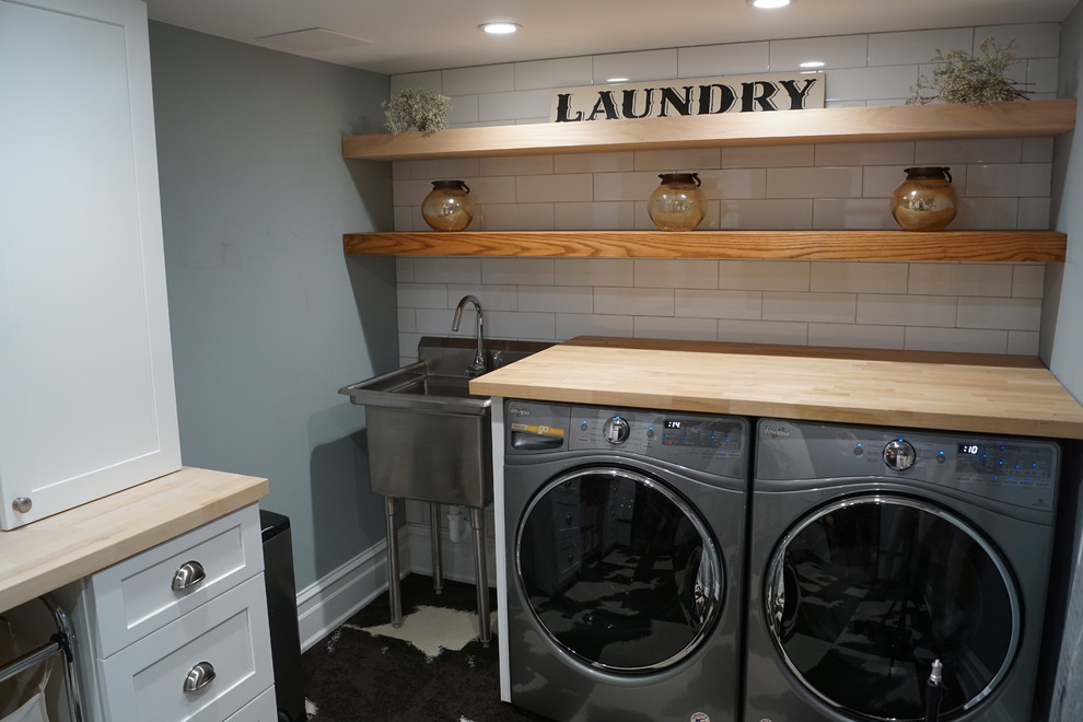 Design ideas for a laundry room in New York with carpet.
