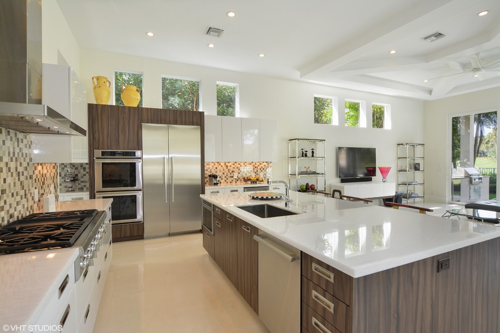 This is an example of a contemporary l-shaped eat-in kitchen in Miami with an undermount sink, flat-panel cabinets, brown cabinets, quartz benchtops, mosaic tile splashback, stainless steel appliances, porcelain floors and with island.