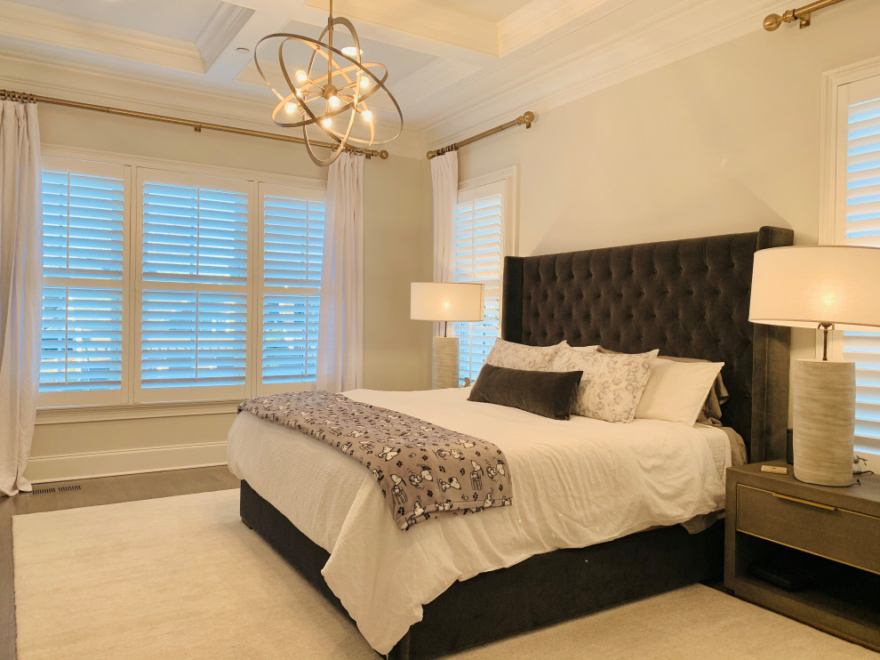 Example of a mid-sized arts and crafts master light wood floor and brown floor bedroom design in Nashville with gray walls