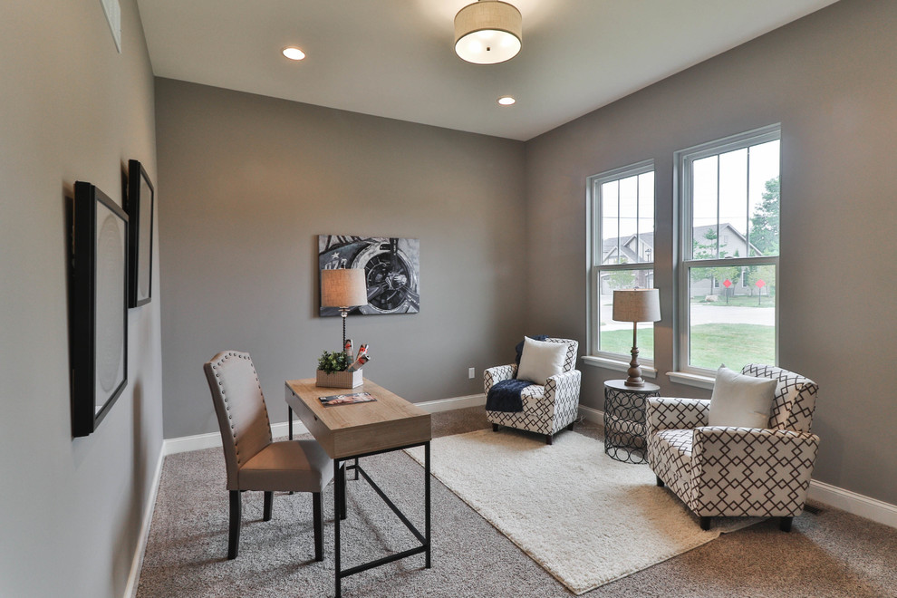 Mid-sized transitional home office in St Louis with grey walls, carpet, no fireplace, a freestanding desk and beige floor.