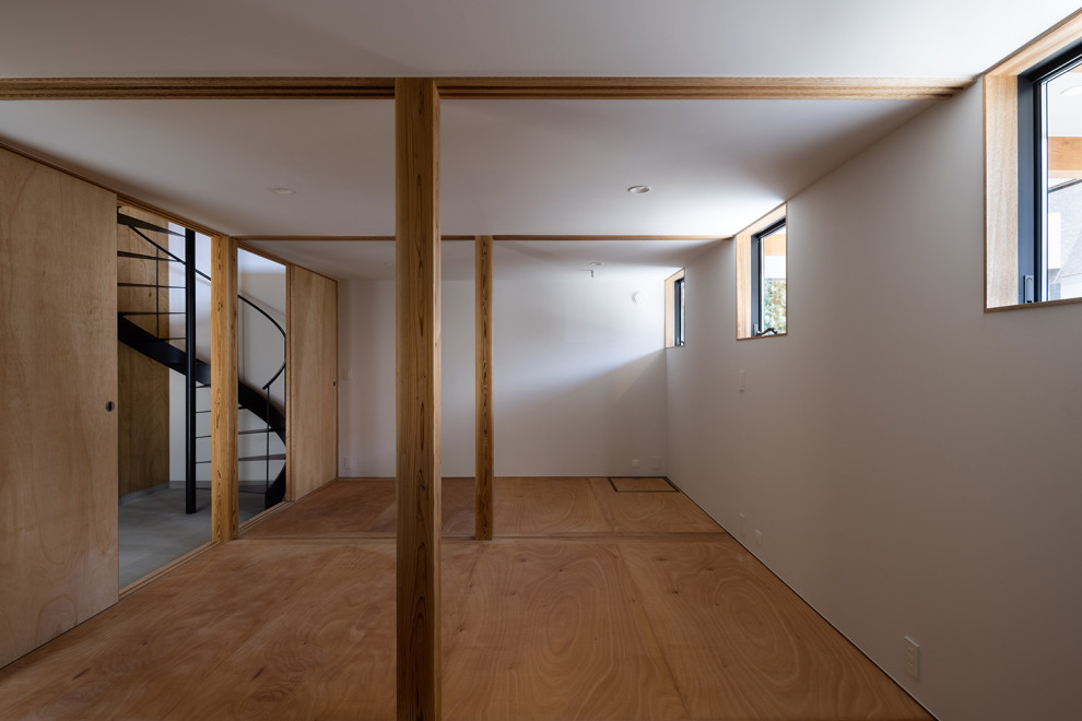 Kids' room - mid-sized zen girl brown floor, shiplap ceiling and shiplap wall kids' room idea in Tokyo with white walls