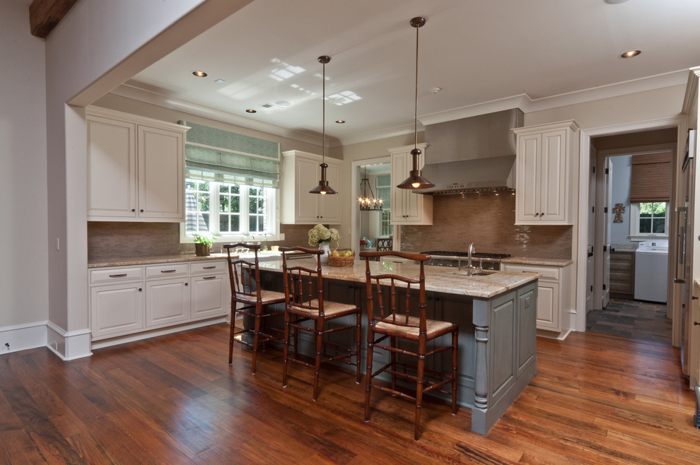Inspiration for a traditional kitchen in Other with raised-panel cabinets and white cabinets.