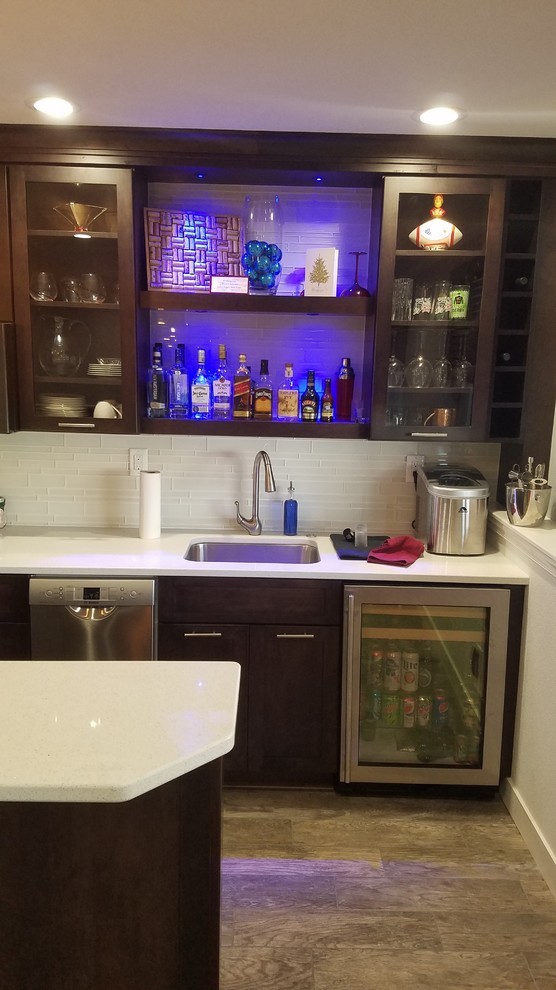 Example of a small transitional home design design in Cedar Rapids