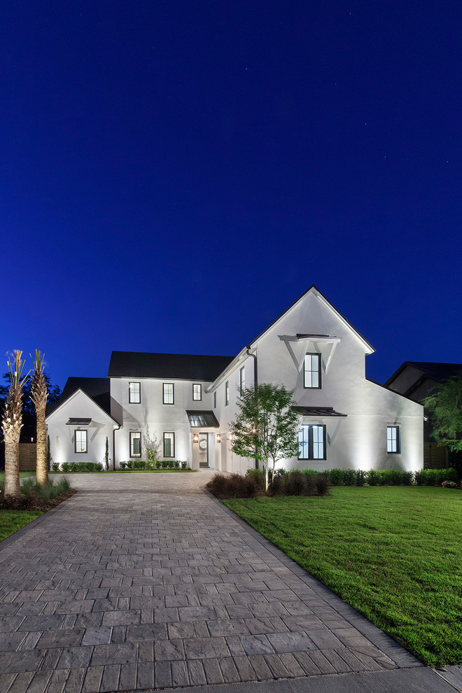Large country two-storey stucco white exterior in Orlando.