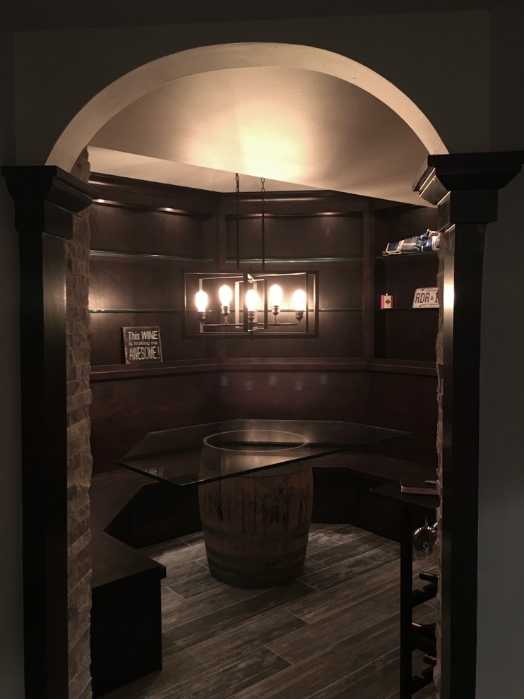 Example of a mid-sized transitional underground dark wood floor and brown floor basement design in Chicago with beige walls and no fireplace