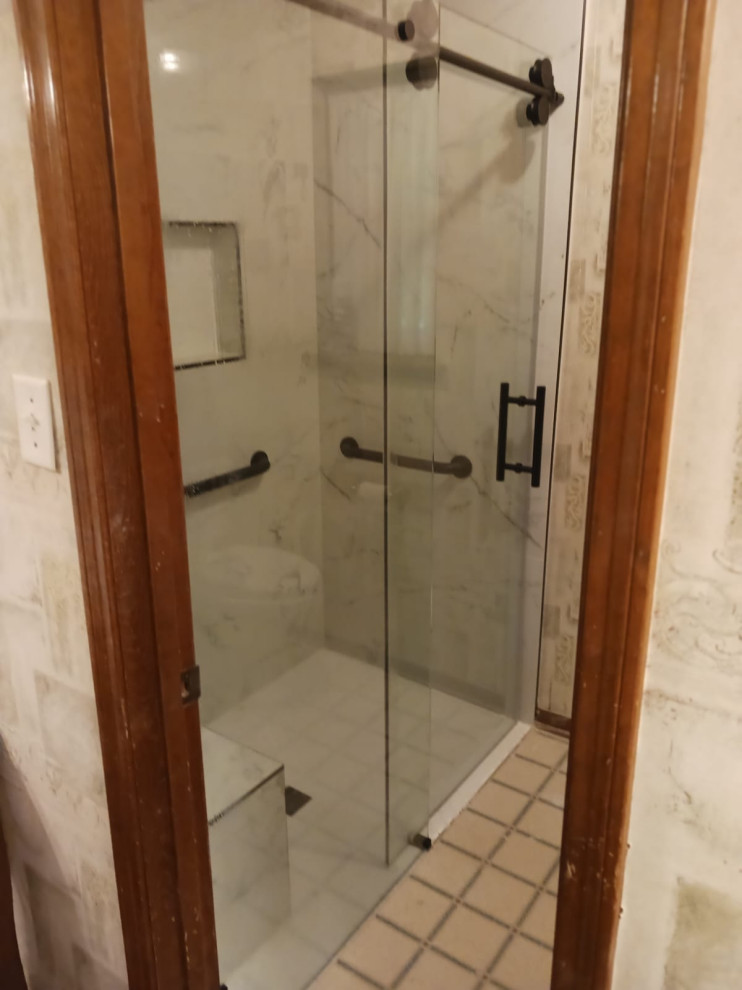 ADA  Shower build up. after shower was completed with glass