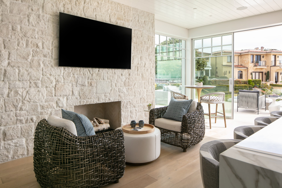Inspiration for a transitional home bar remodel in Orange County
