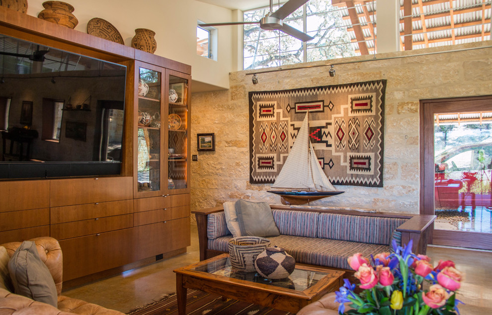 This is an example of a contemporary family room in Austin.