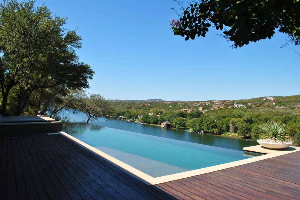 Modern pool in Austin with decking.