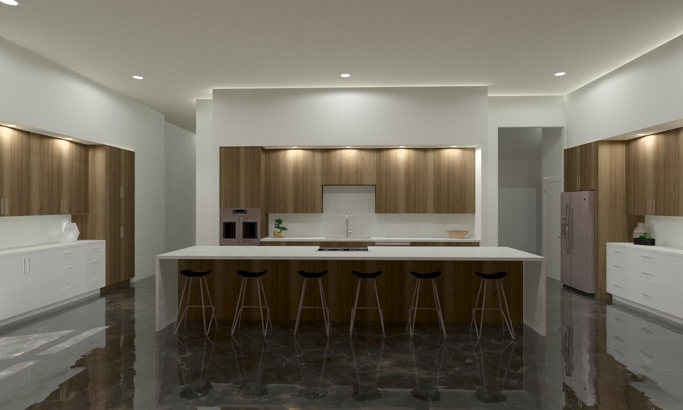 Inspiration for an u-shaped concrete floor and multicolored floor eat-in kitchen remodel with a drop-in sink, flat-panel cabinets, white backsplash, stone slab backsplash, paneled appliances, an island and white countertops