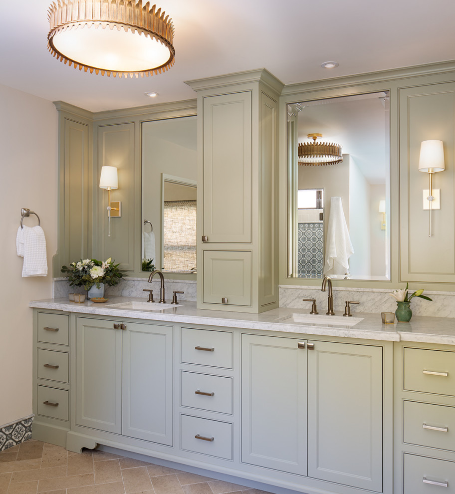 Design ideas for a medium sized traditional ensuite wet room bathroom in San Diego with beaded cabinets, green cabinets, a built-in bath, beige walls, limestone flooring, a built-in sink, marble worktops, beige floors, a hinged door, grey worktops, a shower bench, double sinks and a built in vanity unit.