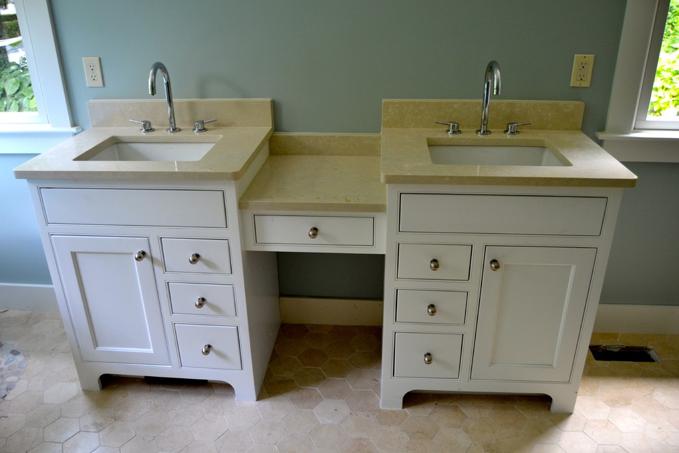Photo of a mid-sized transitional master bathroom in Boston with an undermount sink, flat-panel cabinets, white cabinets, granite benchtops, a corner tub, a corner shower, a one-piece toilet, blue walls and ceramic floors.