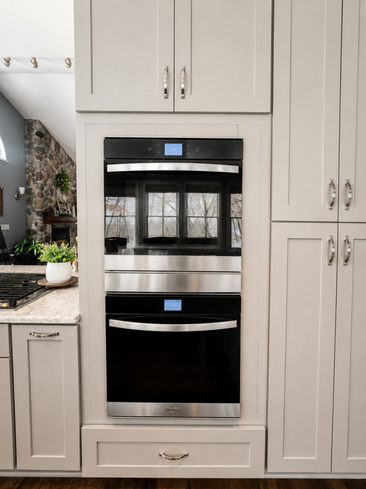 Wolf Lake Modern Lake House | Kitchen & Hardwood Flooring