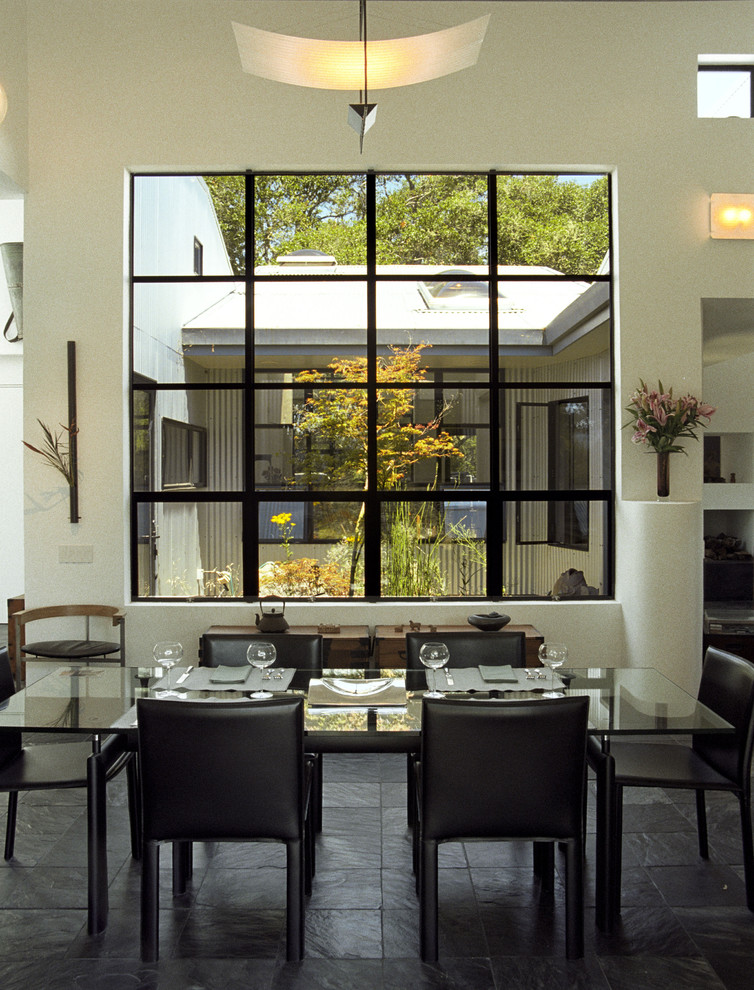 Inspiration for a contemporary dining room in San Francisco with white walls.