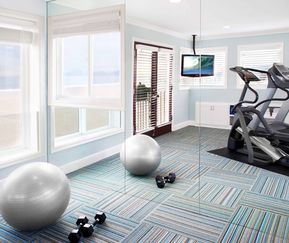 This is an example of a traditional home gym in Los Angeles with multi-coloured floor.