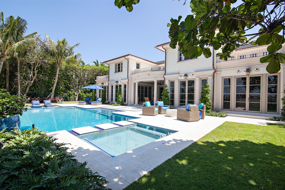 Huge transitional backyard rectangular hot tub photo in Miami