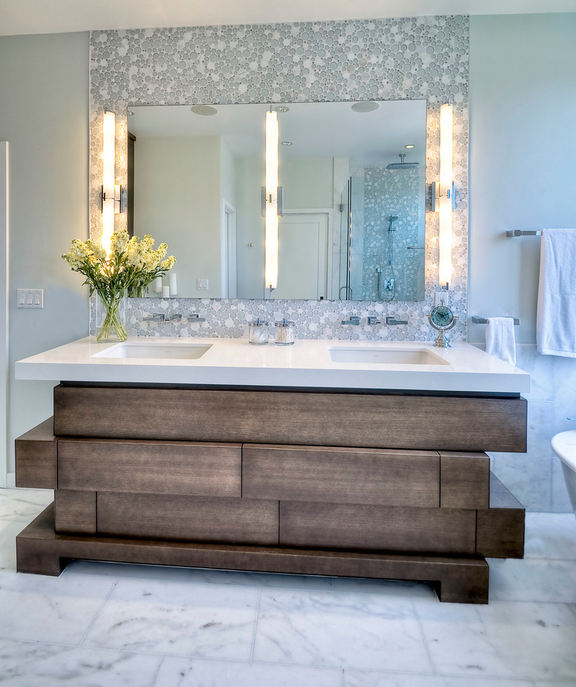 This is an example of a mid-sized contemporary master bathroom in San Diego with an undermount sink, furniture-like cabinets, dark wood cabinets, engineered quartz benchtops, gray tile, mosaic tile, grey walls and marble floors.
