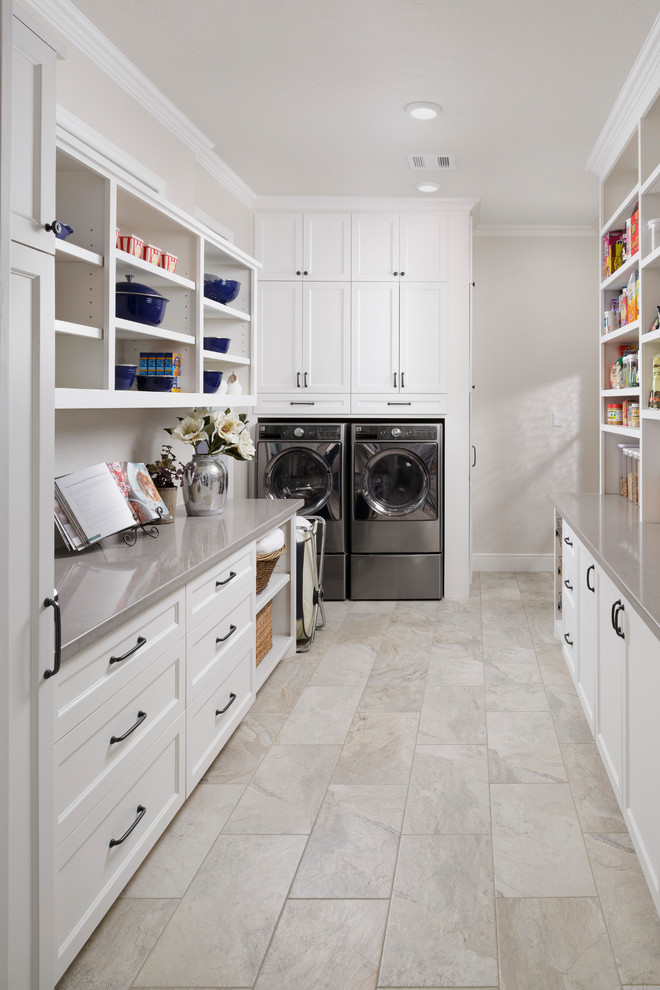 Transitional laundry room in Houston.
