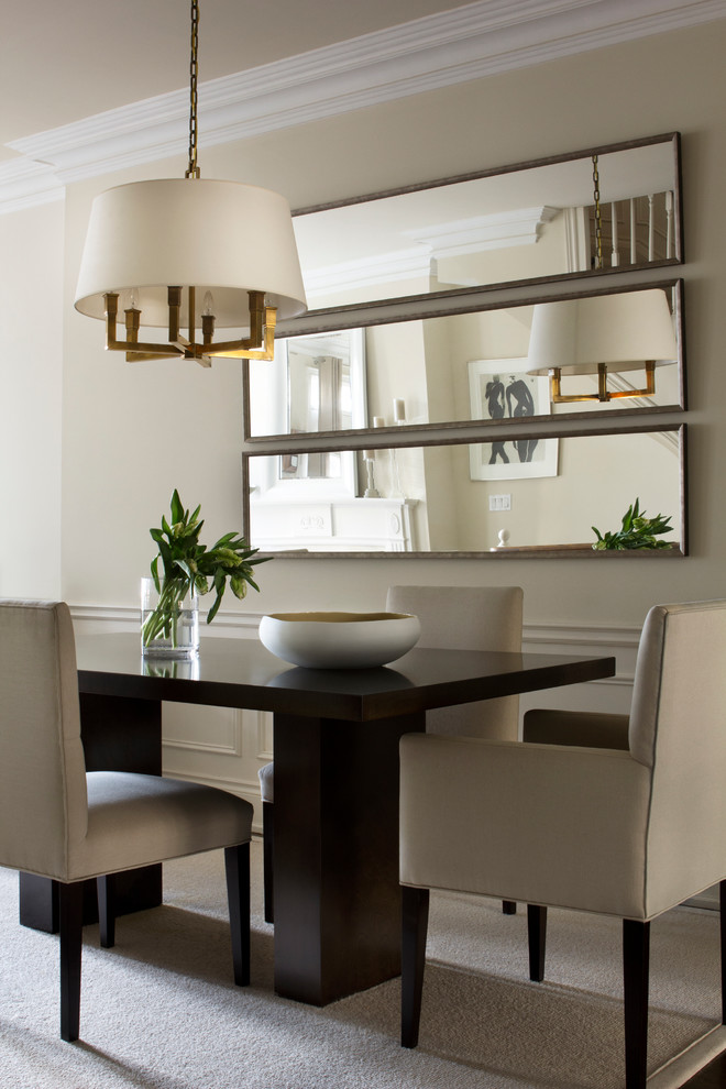 Photo of a transitional dining room in Toronto with beige walls and beige floor.