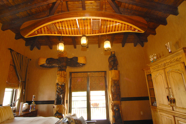 Boy's Bedroom with Canoe and Exposed Ceiling