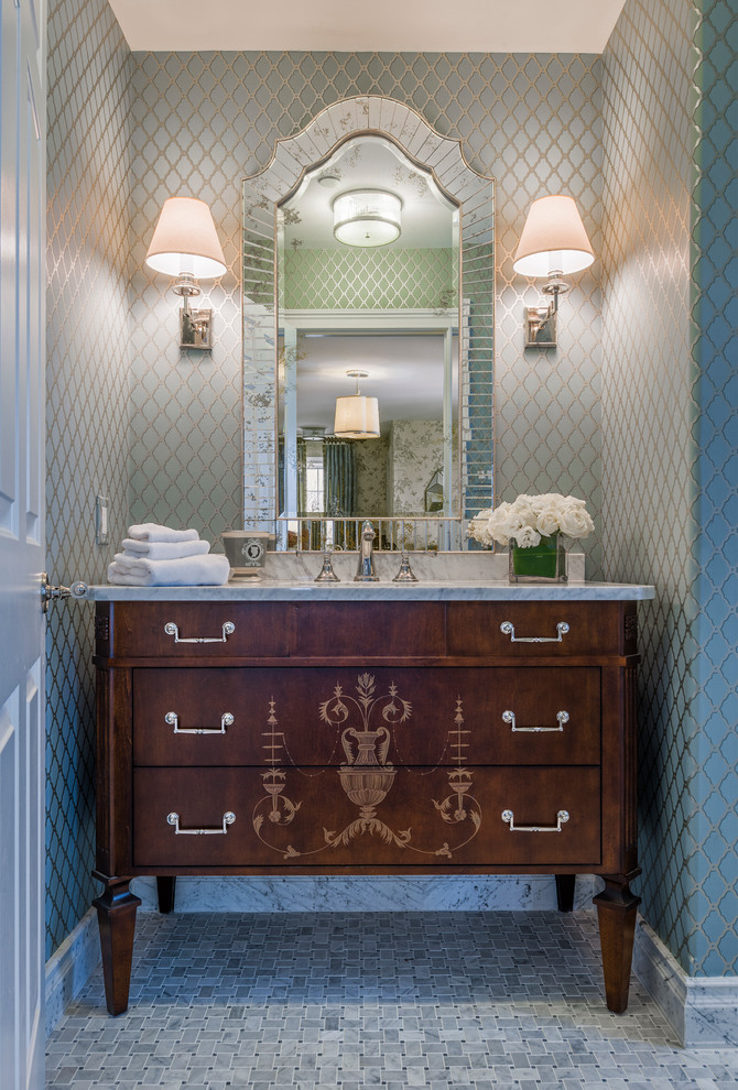 Design ideas for a traditional powder room in Philadelphia with furniture-like cabinets and mosaic tile floors.