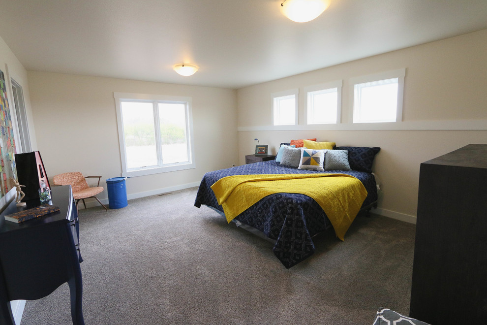 Large country guest bedroom in Other with carpet.