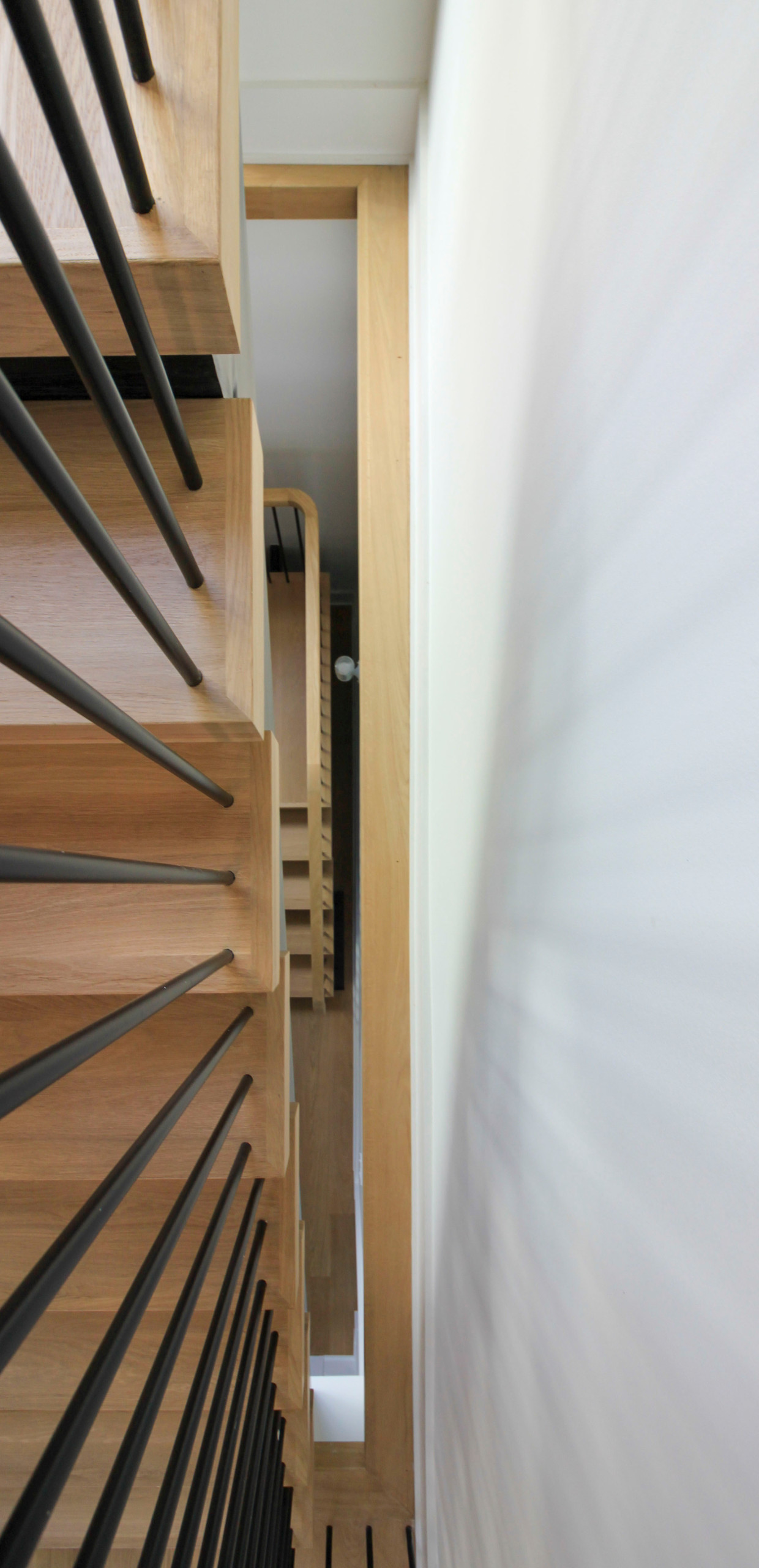 96_Dramatic cantilevered no-riser staircase, Bethesda, MD 20814